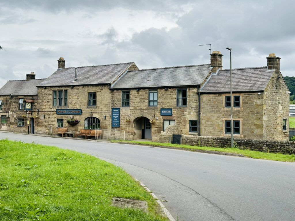 The Square and Compass Pub - A pretty two storey stone building in Darley Bridge on the route of Walk 1 of our Walks around Darley Dale